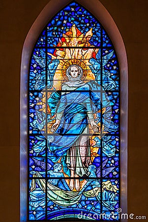 Saint Mary on stained glass window inside the cathedral of Castellon de la Plana, Spain Editorial Stock Photo