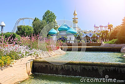 Castelnuovo del Garda, tree, Italy - September 31 2016: Gardaland Theme Park in Castelnuovo Del Garda, Verona, Italy.Sun Ray Stock Photo