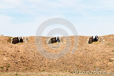 Cannons in the wall of the Portuguese Castelo de Almeida Stock Photo