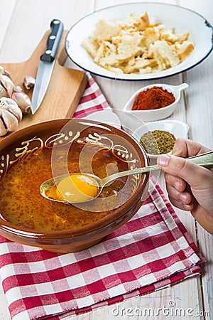 Castilian or garlic soup with eggs Stock Photo