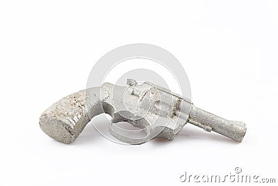 Casting of old metal hand firearm. Colt of tin separated on white background. Stock Photo