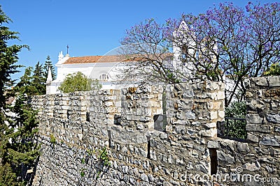 Castle battlements and church, Tavira. Stock Photo