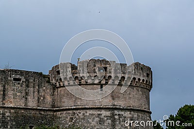 Italy. Matera. Tramontano Castle, 16th century AD The mighty circular building of a one of the two side towers Editorial Stock Photo