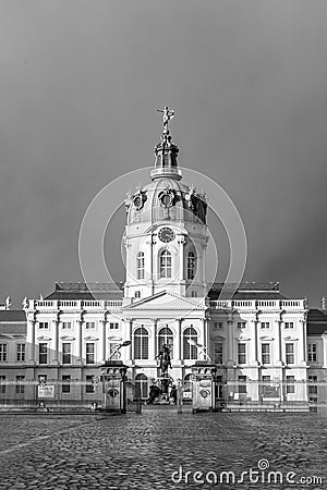 Castle Charlottenburg in Berlin under dark clouds Stock Photo