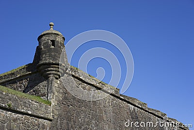 Castle curtain wall with corner tower Stock Photo