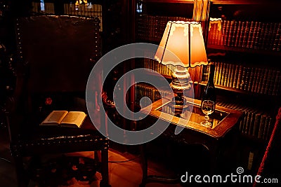 Castle interior, Carved wooden baroque furniture, library, table with warm lamp, Historic Medieval Romantic castle Hradek u Editorial Stock Photo