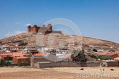 The Castillo de la Calahorra is on a hill, cerro Amesetado, 1240 m above sea level in the flanks of the mighty Sierra Nevada. Stock Photo