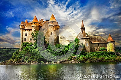 castle on lake over sunset Stock Photo