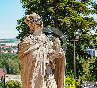 Sculpture of a holy man in the castle in Nitra, Slovakia Editorial Stock Photo