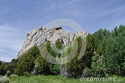 Castle Rock Above the Trees Stock Photo