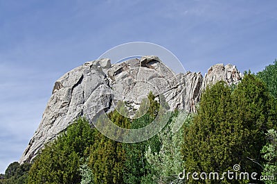 Castle Rock Above the Trees Stock Photo