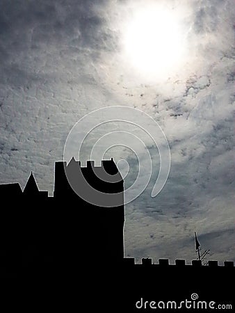 Black castle and cloudy sky Stock Photo