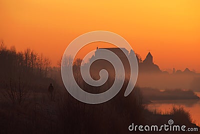 Castle Silhouette In Winter Morning Stock Photo