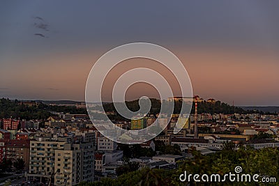 Castle Spilberk time-lapse captured in wide before sunset and castle turn on red light view in Brno city streets with building and Editorial Stock Photo