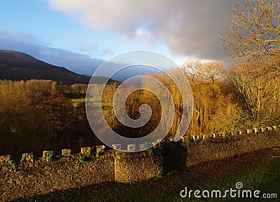 Castle Wall and valley in Wales, UK Stock Photo