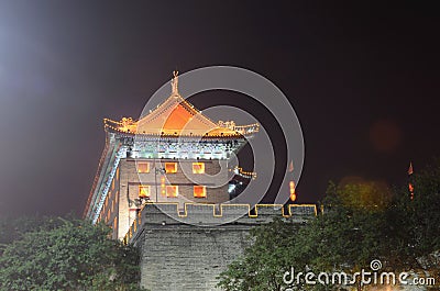 Castle walls at night Stock Photo