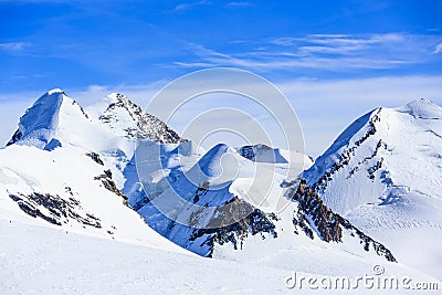 Castor and Pollux, Roccia Nera and slope of Breithorn, above Gorner glacier adjacent Matterhorn, Zermatt, Switzerland Stock Photo