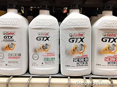 Castrol GTX motor oil bottles on shelf Editorial Stock Photo