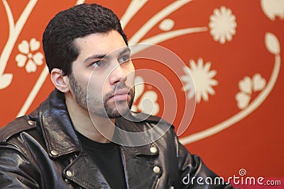 Casual arab young egyptian businessman thinking Stock Photo