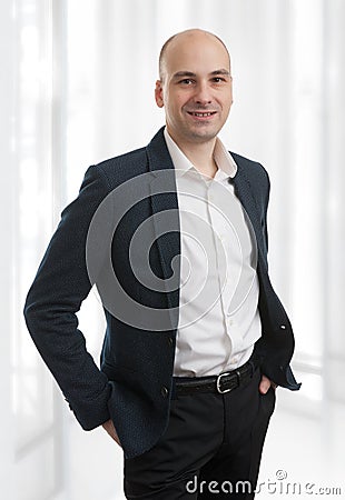 Casual bald man wearing suit Stock Photo