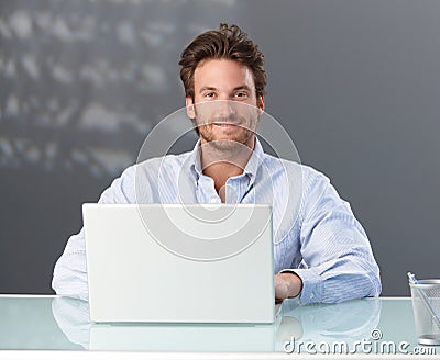 Casual businessman with computer Stock Photo