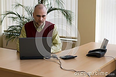 Casual businessman with laptop Stock Photo