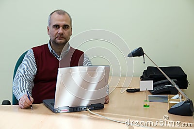 Casual businessman with laptop Stock Photo