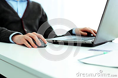 Casual businessman working on laptop Stock Photo