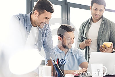 Casual businessmen working on new project at modern office Stock Photo