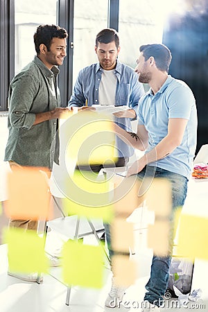 Casual businessmen working on new project at modern office Stock Photo