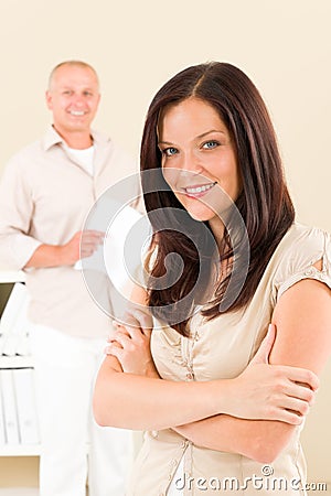 Casual businesswoman smiling crossed arms Stock Photo