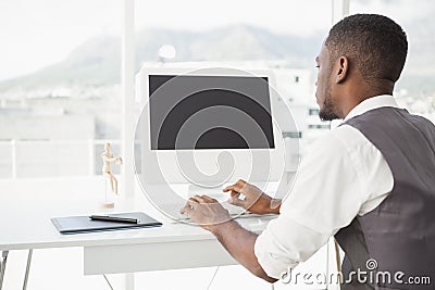 Casual man working at desk with computer and digitizer Stock Photo