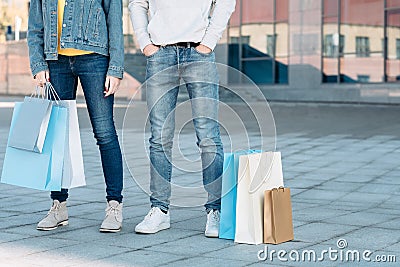 Casual shopping couple sale consumerism legs jeans Stock Photo