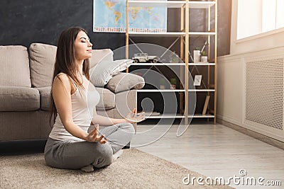 Casual woman doing relaxing yoga asana Stock Photo