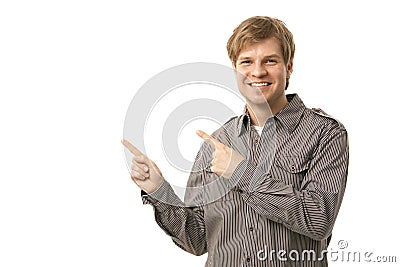 Casual young man pointing to blank space Stock Photo