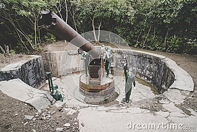 Cat Ba Island, Lan Ha Bay, Vietnam 09.01.2018: Cannon Fort Artillery gun 138 mm Soldiers. The gun posts World War II, French Editorial Stock Photo