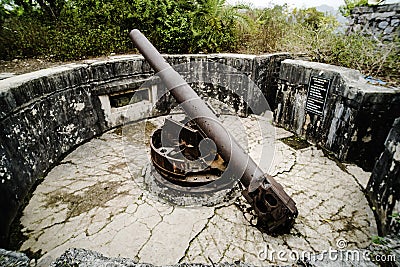 Cat Ba Island, Lan Ha Bay, Vietnam 09.01.2018: Cannon Fort Artillery gun 138 mm Soldiers. The gun posts World War II, French Editorial Stock Photo