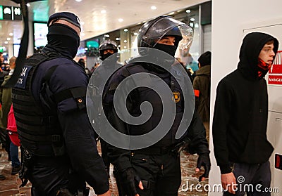 Catalan police mossos secure sants station during an independentist protest detail on officer Editorial Stock Photo