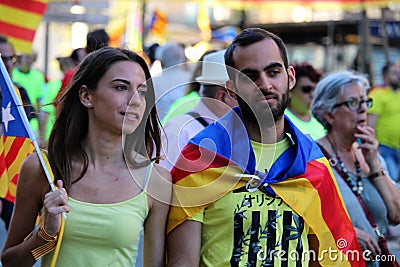 Catalan symbols at Diada independence manifestation Editorial Stock Photo