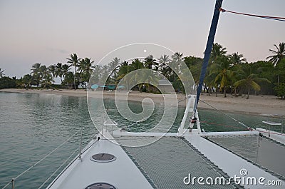 Catamaran on the Caribbean beach in the moonlight Stock Photo