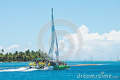 Catamaran in Caribbean sea going to Saona island with happy tourists Editorial Stock Photo