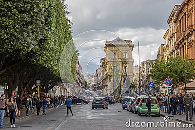 Catania via etnea view towards north from the central park, urban life, cars and walking people Editorial Stock Photo