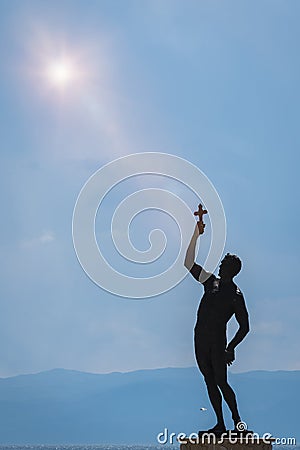 Catcher of a Cross statue Stock Photo