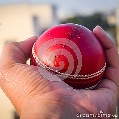 catching cricket ball in one single hand Stock Photo