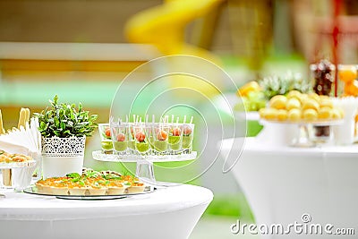 Catering, delicious new welcome canapes of bright color on a skewer Stock Photo