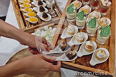 Catering dessert line in wedding ceremony Stock Photo
