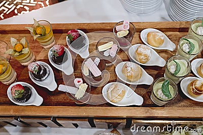 Catering dessert line in wedding ceremony Stock Photo