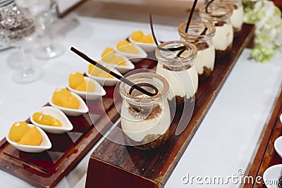 Catering dessert line in wedding ceremony Stock Photo