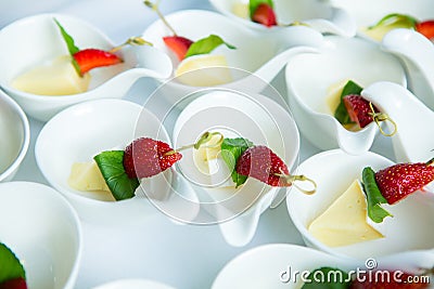 Catering Food Wedding Event Table. Buffet line in Wedding. Delicious appetizer close-up. Stock Photo