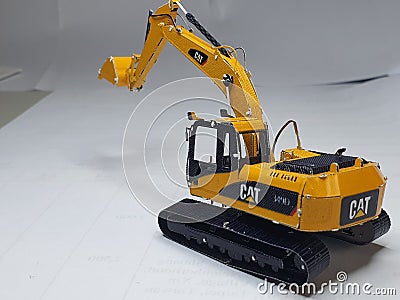 Metal Jigsaw Caterpillar Backhoe Editorial Stock Photo